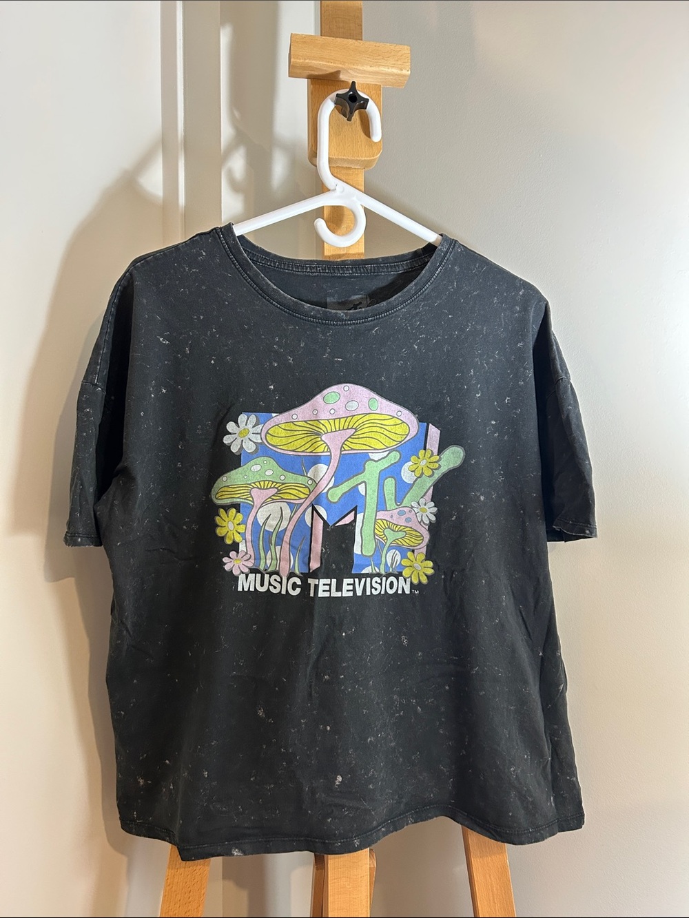 MTV Black Tee with Pastel Mushroom and Floral Graphic